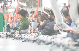 JIUJIANG CHINA-March 17, 2018: workers on the production line of electrical appliances company, Jiujiang, Eastern China  Workers can't relax for a minute, like robots in Chaplin's movie modern times 