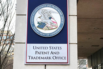 ALEXANDRIA, VA - FEBRUARY 2, 2019: US PATENT AND TRADEMARK OFFICE - Sign seal emblem at headquarters building 