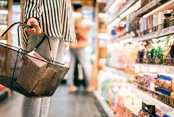 Women choosing products in supermarkets, ready-to-eat food, shopping